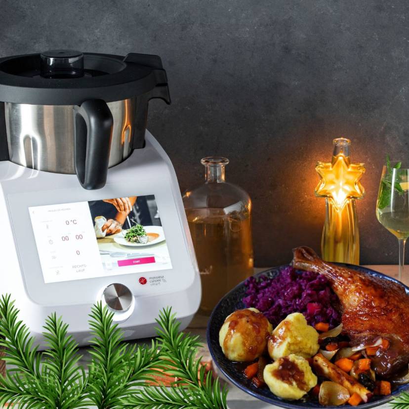 Der Monsieur Cuisine umgeben von festlichen Gerichten, Ente, Dessert, Suppe