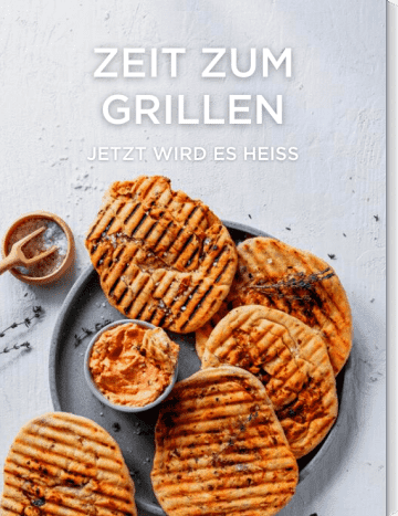 Grillbrot mit Oliven und Dip auf grauem Teller