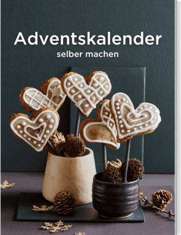 Lolls aus Lebkuchen verziert in Herzform